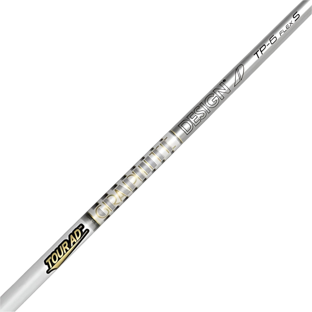 A close-up of a Graphite Design Tour AD TP golf shaft with silver color and gold accents.