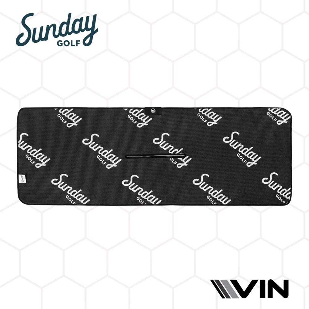 Golf towels with 'Sunday Golf' branding and a honeycomb pattern in the background. The towels are black with white and gray text and design elements.