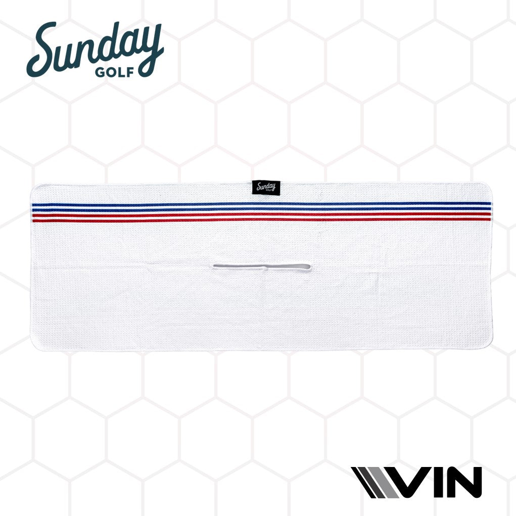 Sunday golf tag on a plain white with red and blue striped towel