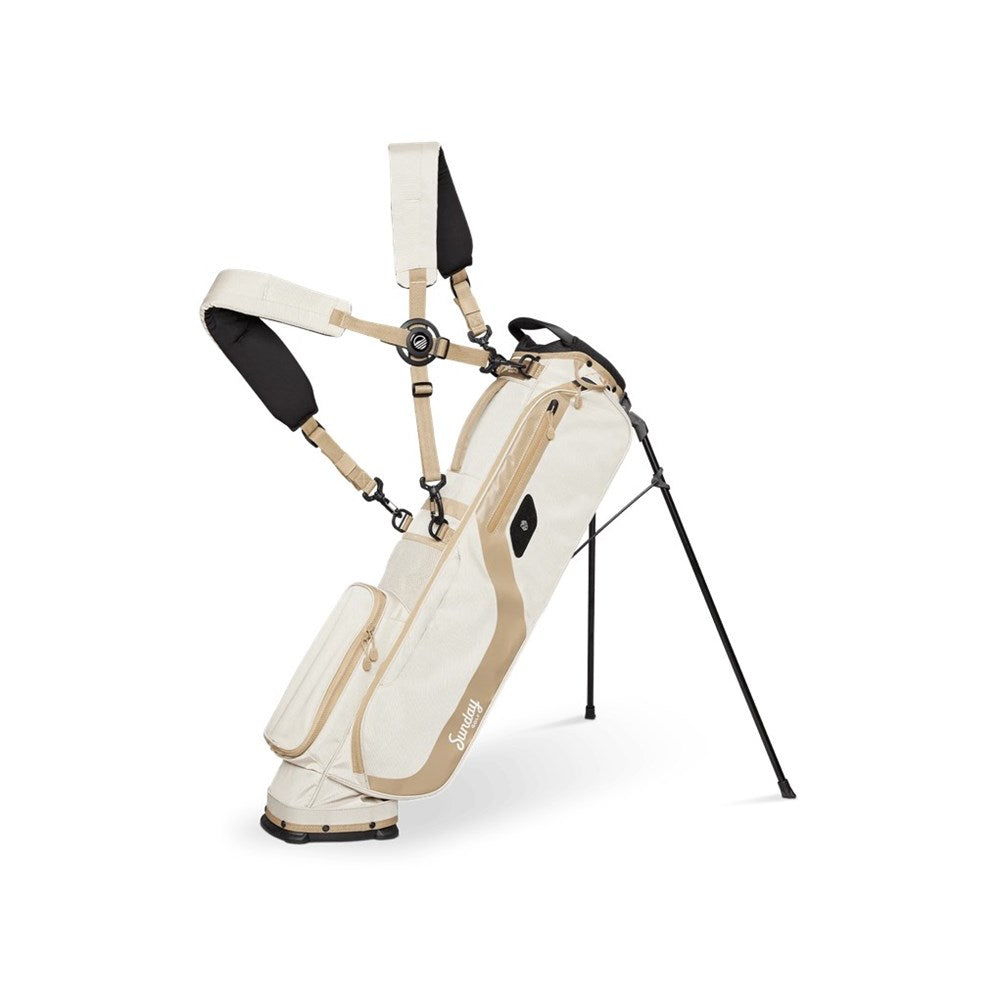 White and beige golf bag with stand on a white background