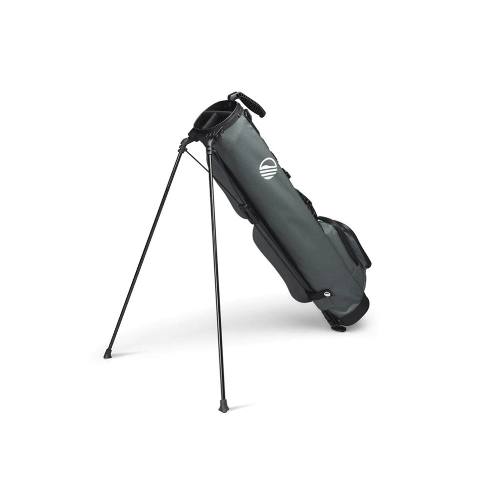 A gray golf bag with a stand system deployed, featuring multiple pockets and a shoulder strap.