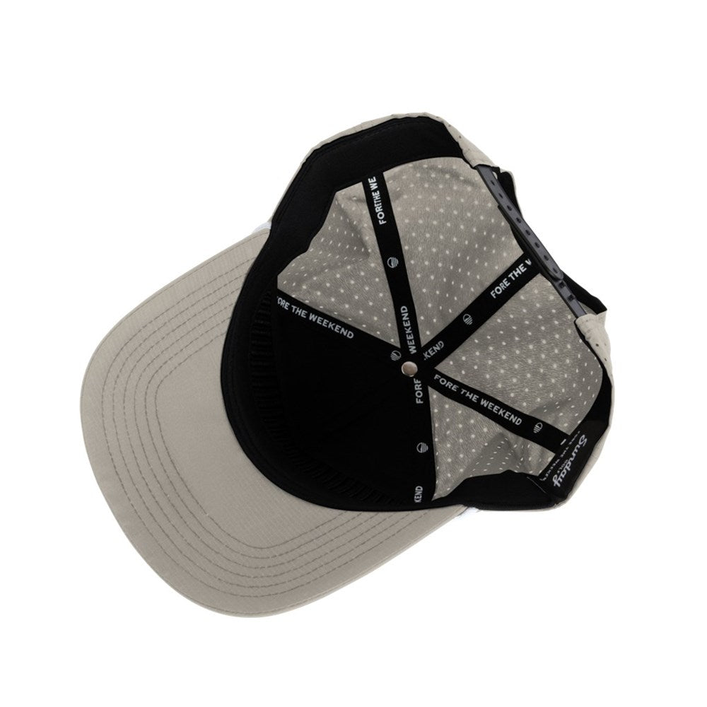 A beige Porter Lite Snapback golf hat with perforations around the brim and a white Sunday logo on the front.