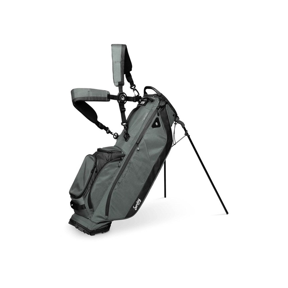 A full-size gray Sunday Golf stand bag with multiple pockets, a built-in carry handle, and a backpack-style strap system.