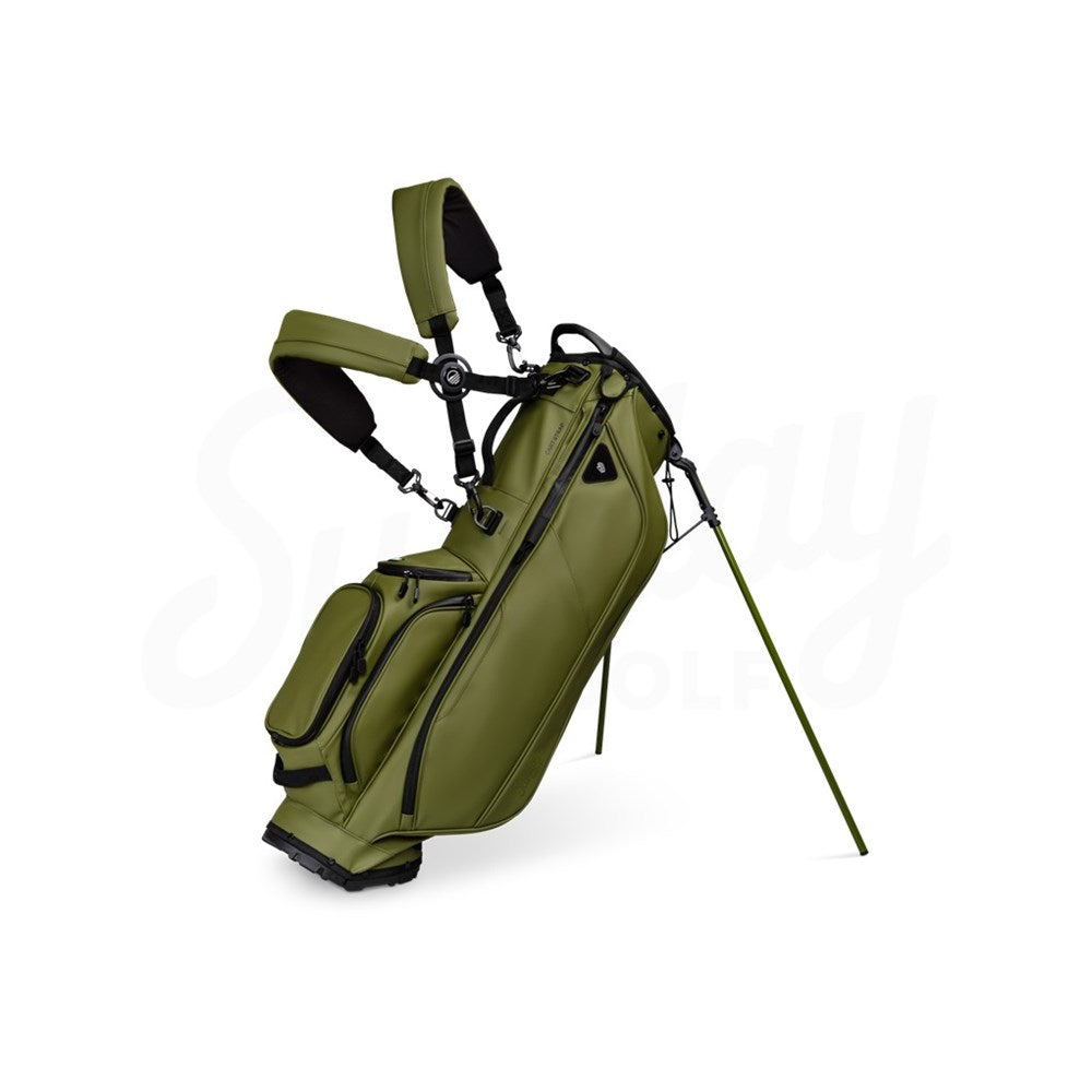 Green golf bag with a stand on a white background