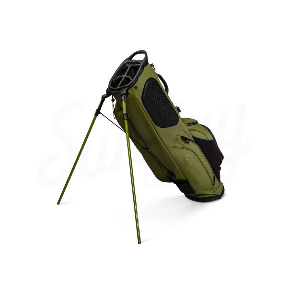 Green golf bag with stand on a white background
