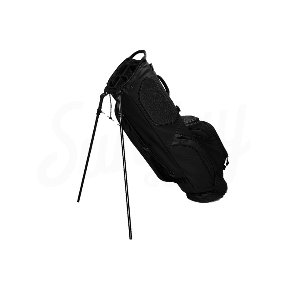 Black golf bag with stand on a white background