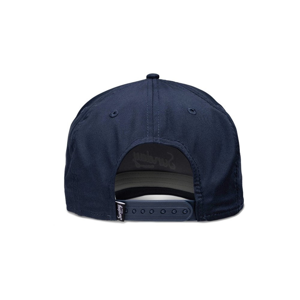 A navy golf hat with white text 'Sunday Golf' and a rope detail around the visor.