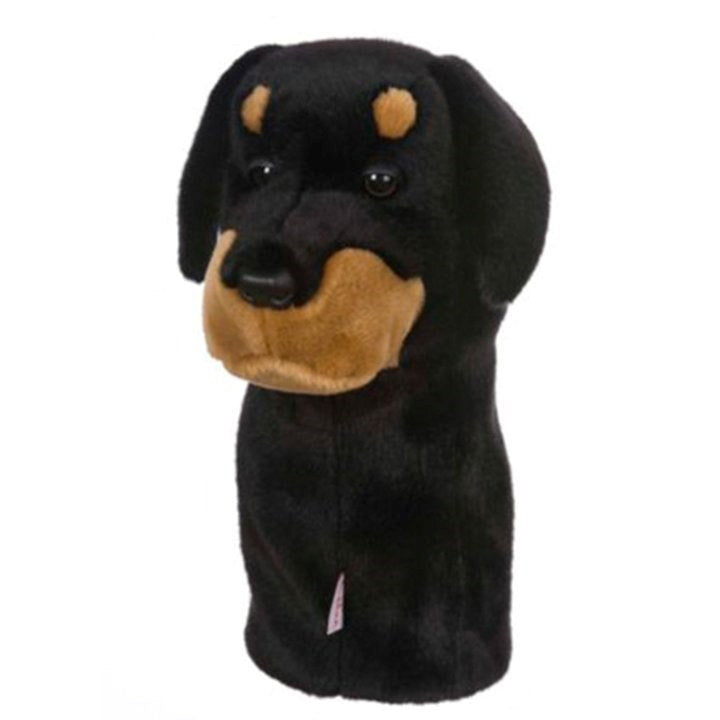 Golf club headcover designed to resemble a dog's head, primarily black with brown accents for the face.