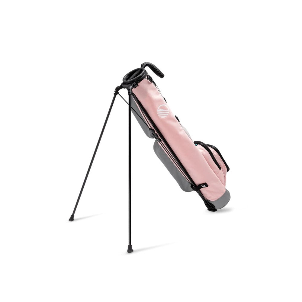 A pink and gray golf bag with a full-length shoulder strap, insulated drink pouch, and built-in stand, displayed on a white background.