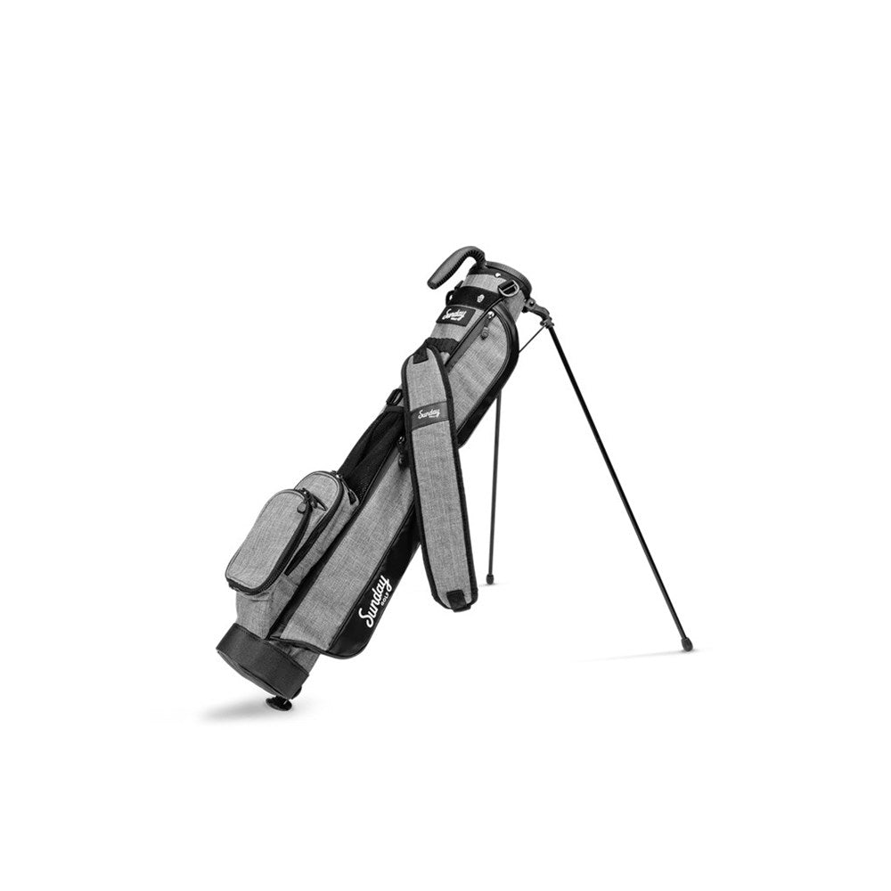 A black and gray Sunday Golf golf bag with a stand, designed for range/green use.