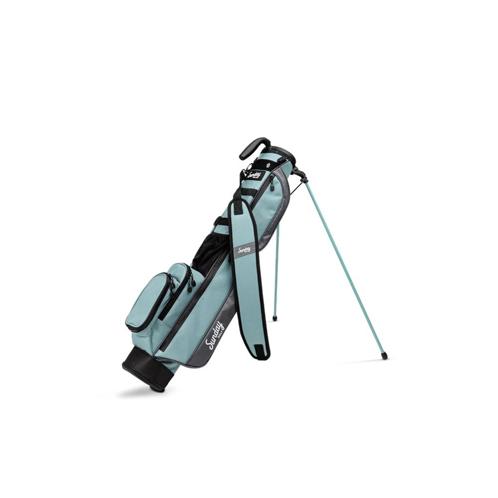 A blue and black golf bag with a stand mechanism deployed, placed against a white background.