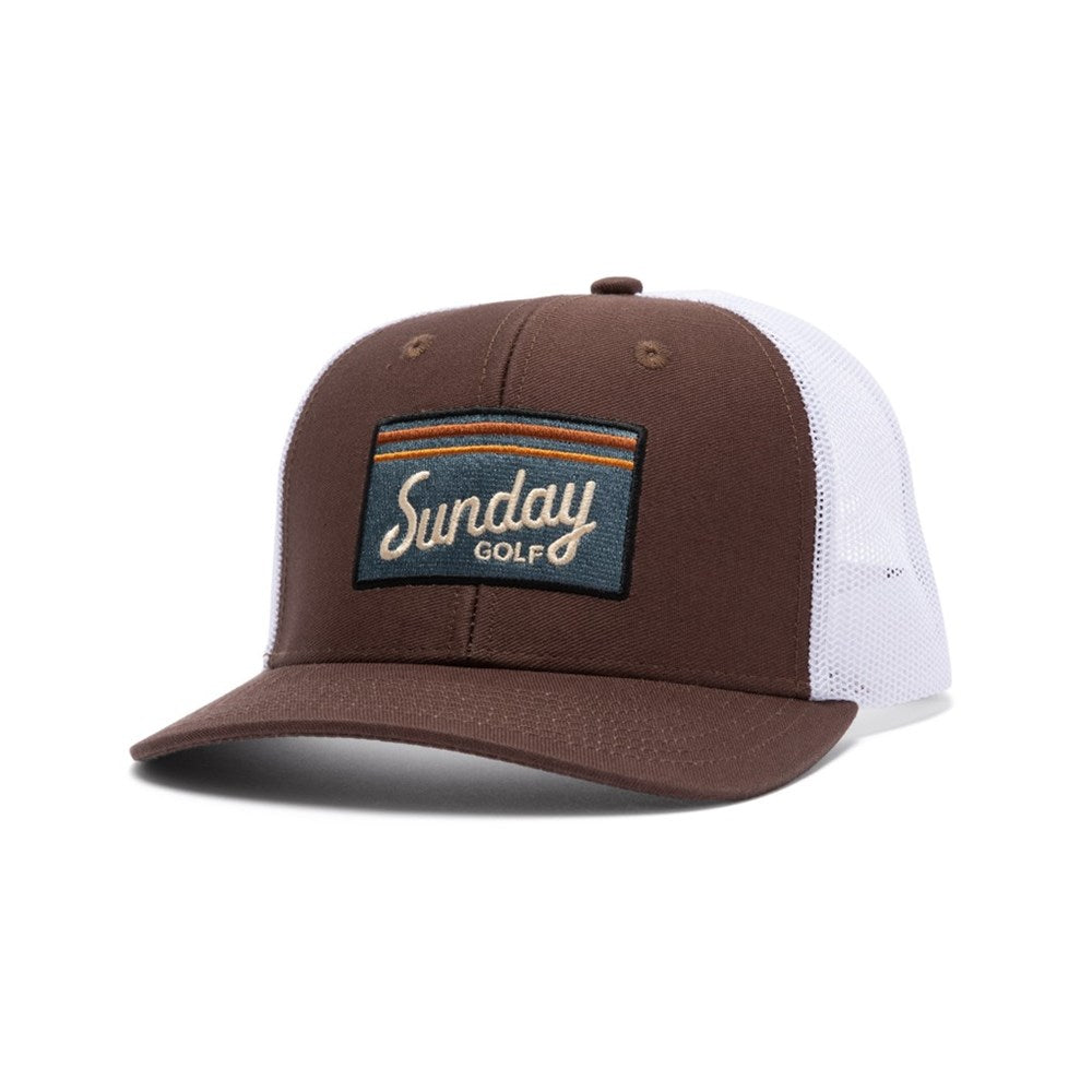 A brown and white trucker golf hat with a mesh back and an embroidered front logo patch reading 'Sunday Golf'.