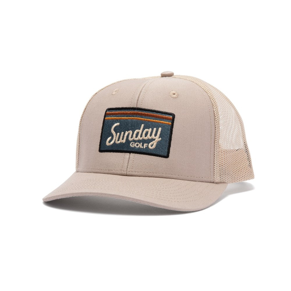 A beige trucker golf hat with a curved bill, featuring a mesh crown and an embroidered front logo patch that reads 'Sunday Golf'.