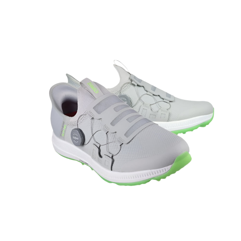A pair of SKECHERS GO GOLF Elite 5 spikeless grey golf shoes with white and green accents.