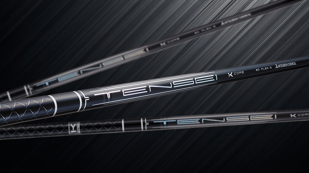 Golf club shafts with 'Tense' branding on a dark background