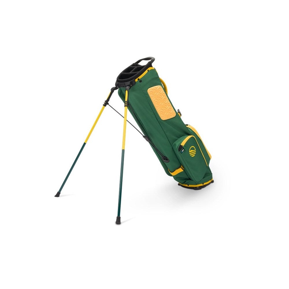 Green and yellow golf bag with stand on a white background