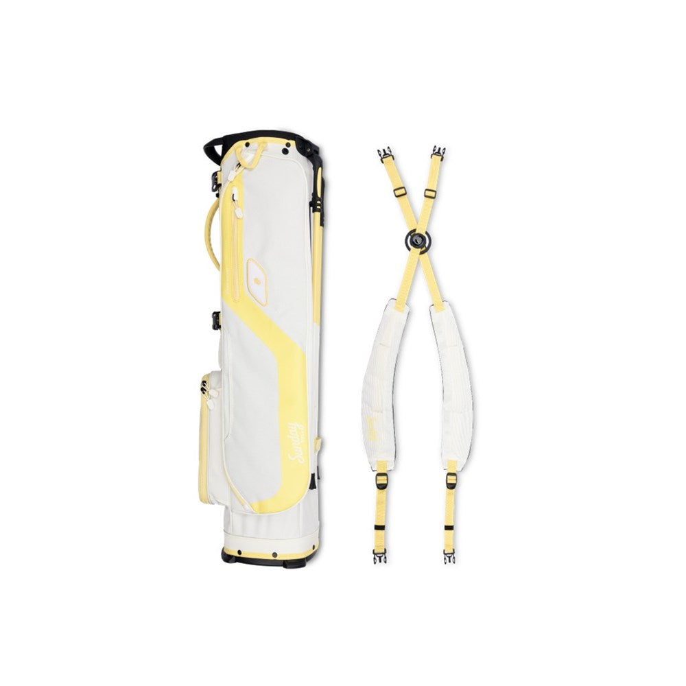 White golf bag with yellow accents and a matching strap on a white background