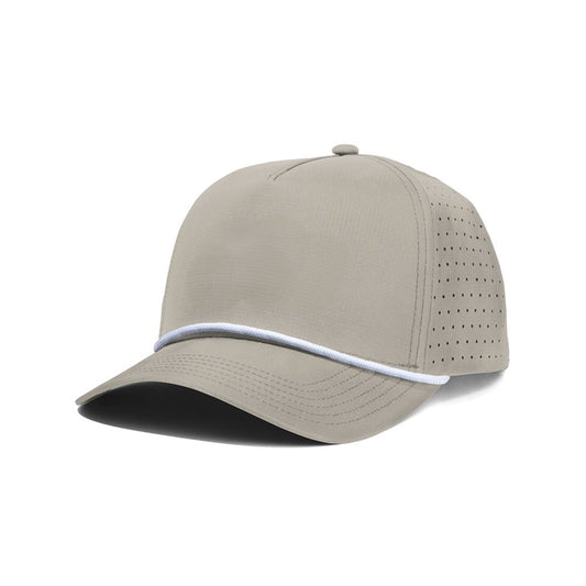 A beige Porter Lite Snapback golf hat with perforations around the brim and a white Sunday logo on the front.