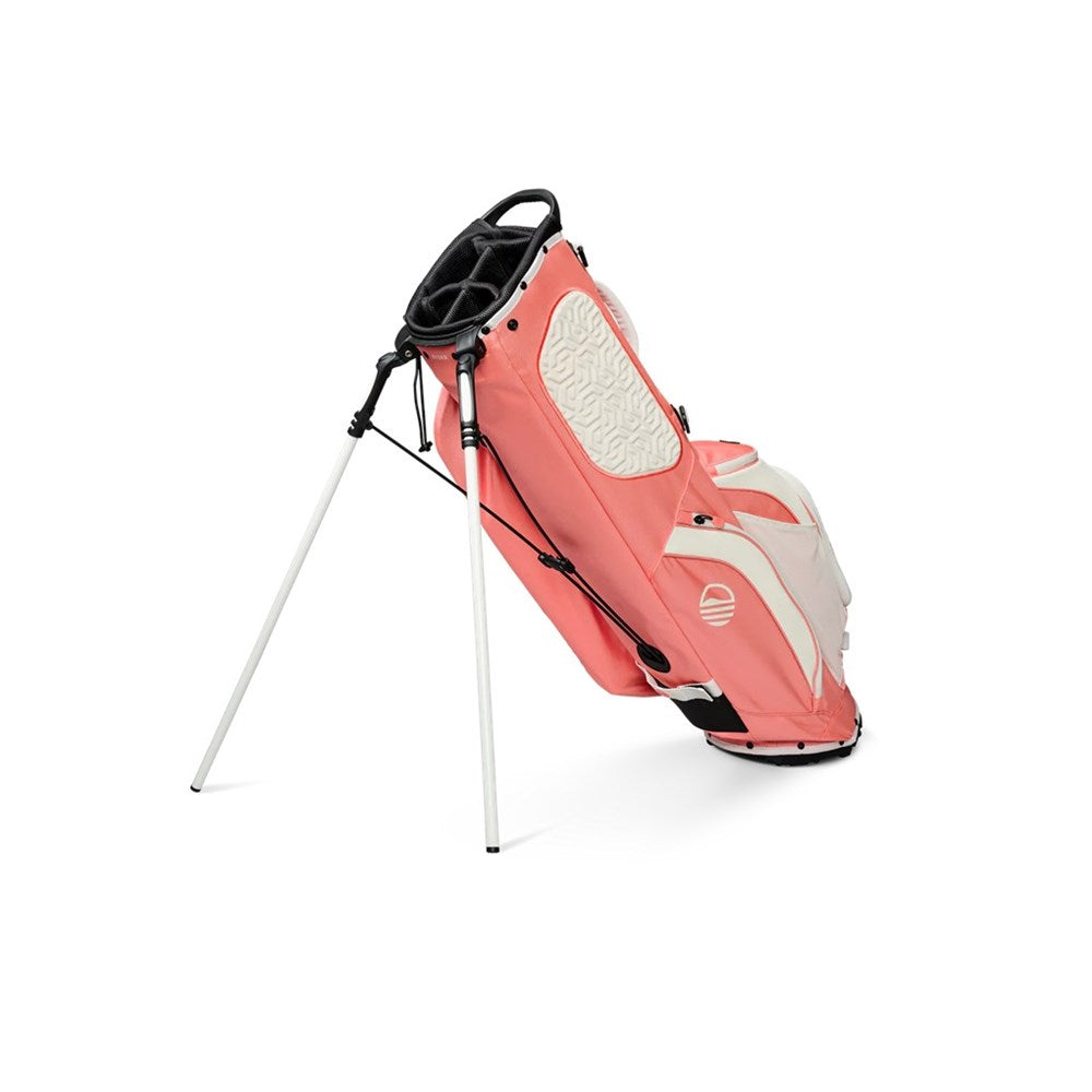 Pink and white golf bag with a stand on a white background